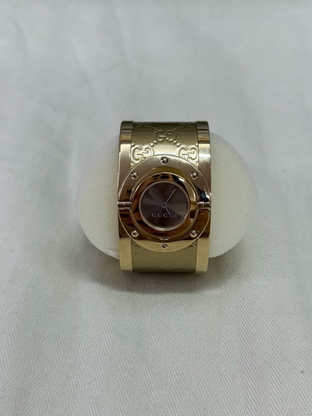 Gucci Gold-Tone Embossed Bangle Watch with Black Dial